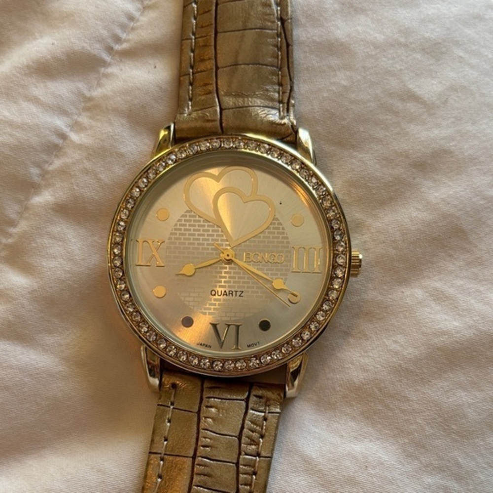 Bongo stainless steel Accutime watch Corp golden hearts and animal textured band